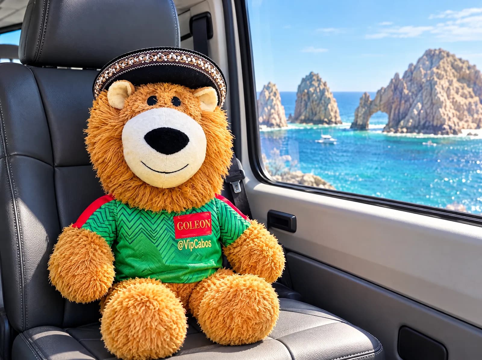 Goleón sitting by the window of a VIP Transportation van with the Cabo coast outside
